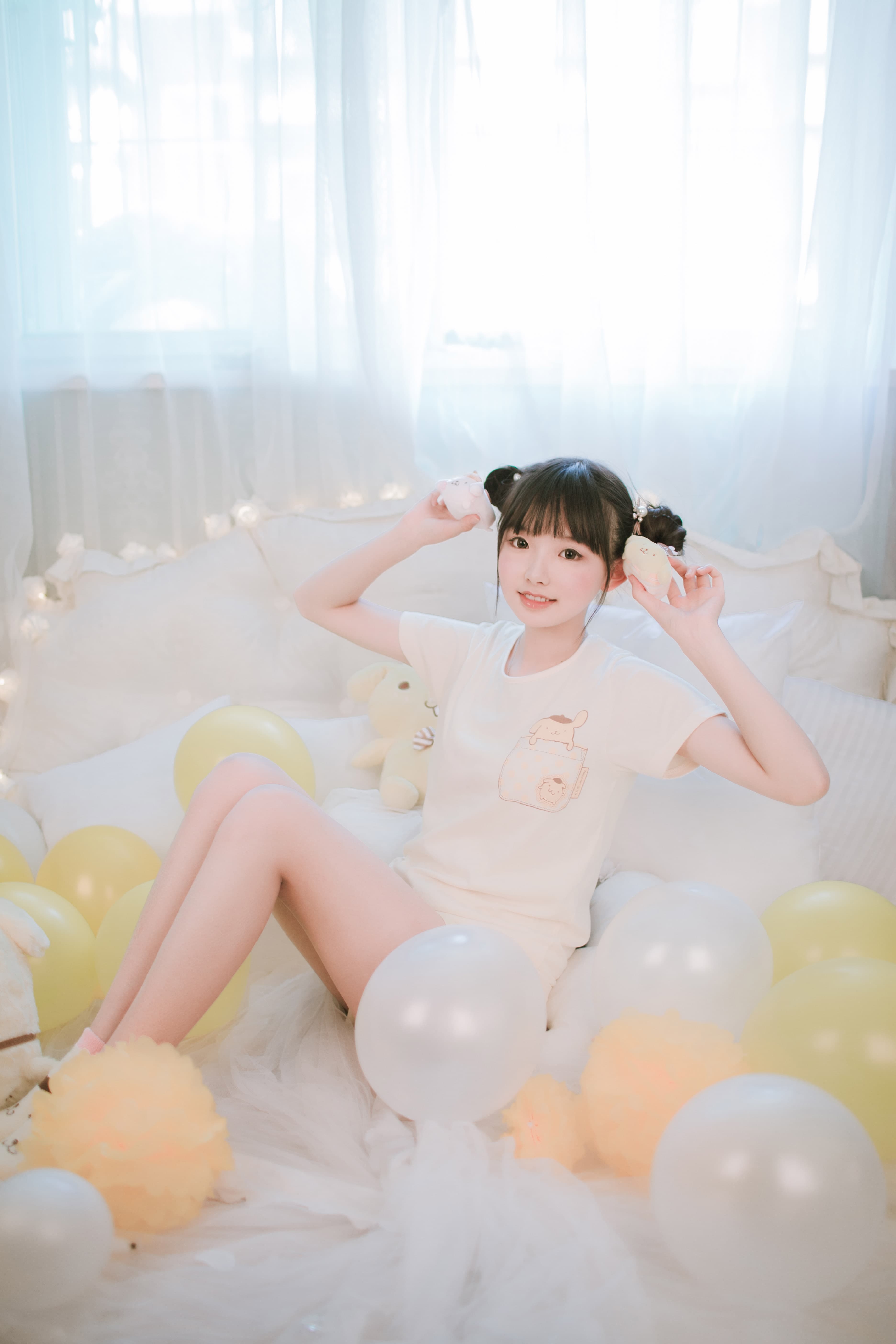 Close-up of fuzzy socks partially pulled down to reveal a bare toe curled playfully